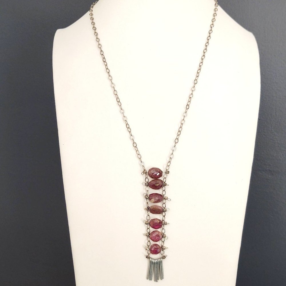 Silver necklace with purple stones and silver dangles